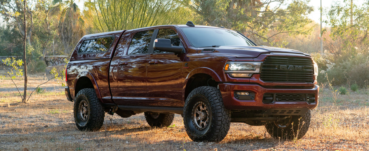 Lifted Ram 2500 heavy-duty truck on Carli Suspension with all-terrain tires