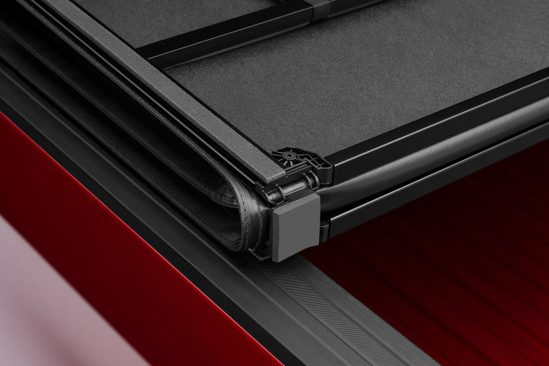 Lund 5.5ft. Bed Hard Fold Tonneau Cover for 2015-2018 Ford F-150 Styleside - Black - view 3