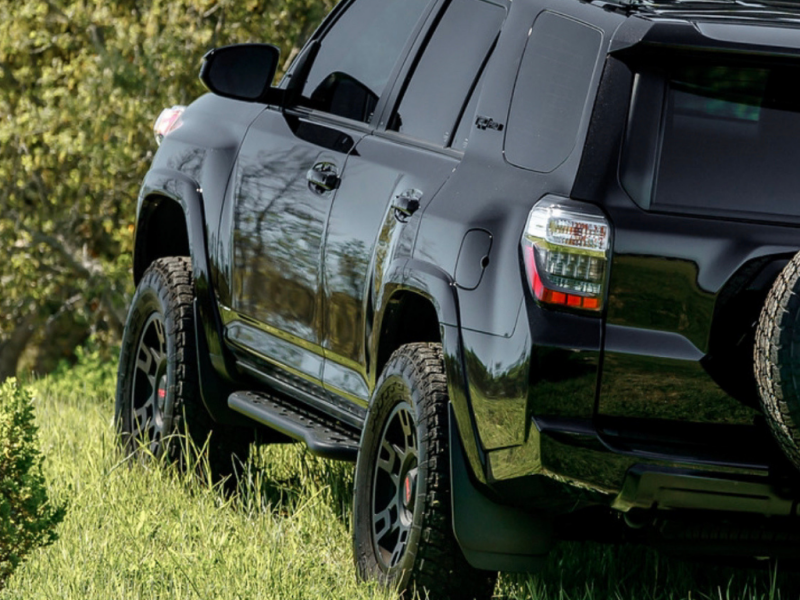 Cali Raised LED 10-24 Toyota 4Runner Step Ed Bolt On Rock Sliders - Kick Out/BedLiner Filler Plate/Pwdr - CR2892