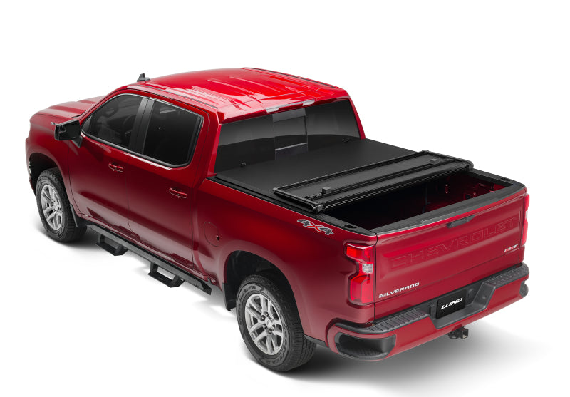 Lund 5.5ft. Bed Hard Fold Tonneau Cover with Bracket Kit for 2004-2015 Nissan Titan - Black - view 2