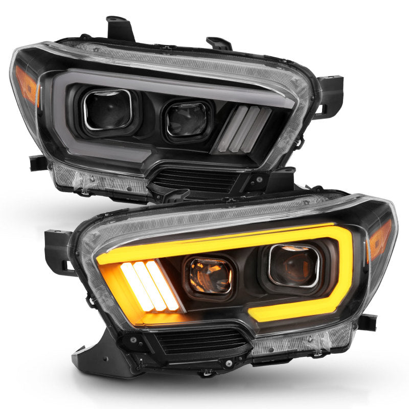ANZO Projector Plank Style Switchback Headlights w/ DRL, Black - 2016-2023 Toyota Tacoma (For halogen version with LED DRL) - ANZO part 111397